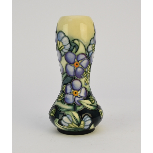 228 - A Moorcroft vase in a 'Forget-me-Not' pattern designed by Sandra Dance, dated 2004, purple flowers w... 