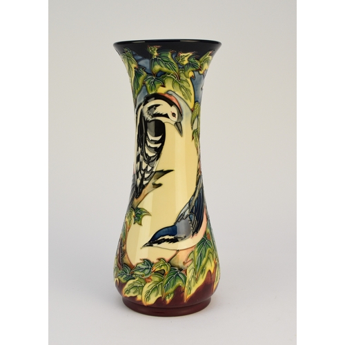 240 - A Moorcroft vase in the 'Inglewood' pattern designed by Philip Gibson, dated 2003, decorated with a ... 