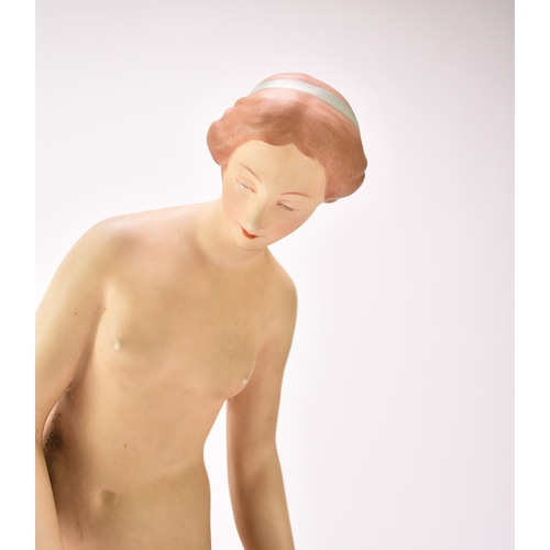 262 - A Royal Dux model of a nude female bather, impressed 27821, raised pink triangle mark, 39.5cm high