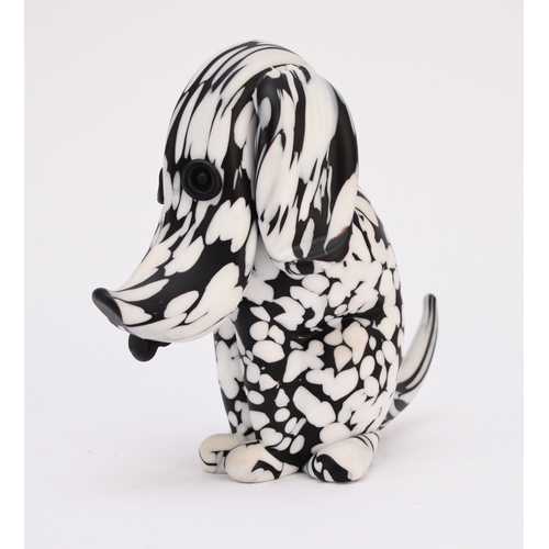 304 - An Archimede Seguso (Murano) glass model of a seated dog, circa 1950s, sculpted in black and white f... 