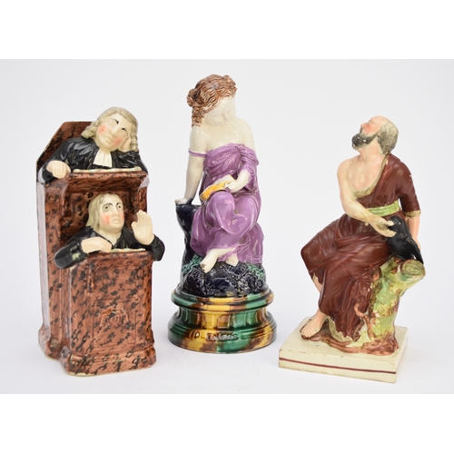 52 - A Staffordshire model of Vicar and Moses, the Vicar asleep at the pulpit, circa 1820, 24cm high; tog... 