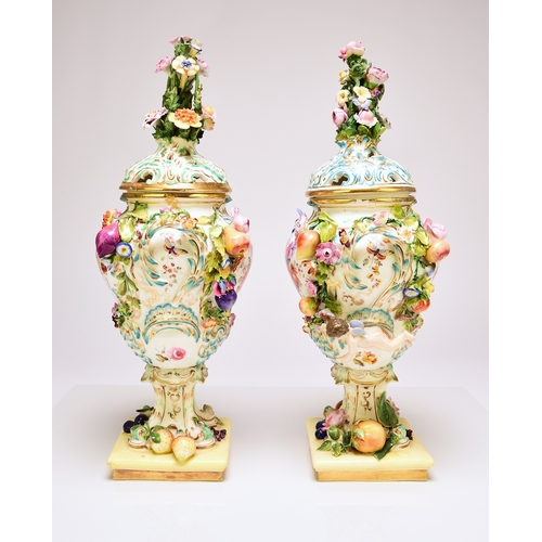 80 - A pair of rare Coalport 'Coalbrookdale' floral encrusted potpourri vases and covers, circa 1825-30 t... 