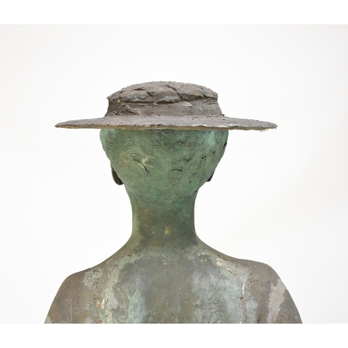 482 - Bernard Sindall (1924/5-1998) Woman in a Hat, c.1972, fibreglass sculpture, 163 x 63 x 45 cm This is... 