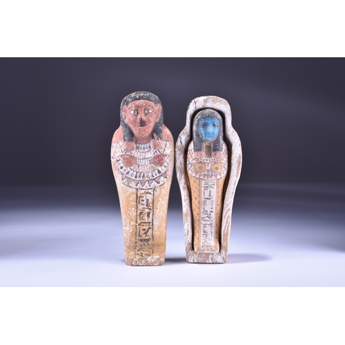 533 - A reproduction Shabti and coffin case, late 19th to early 20th century A miniature wooden coffin con... 