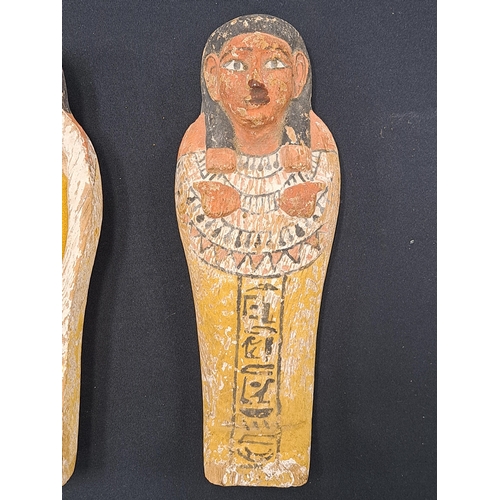 533 - A reproduction Shabti and coffin case, late 19th to early 20th century A miniature wooden coffin con... 