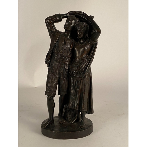 534 - After Fernand Lorrain (19th century), a bronze figure of lovers sheltering from the rain Dark brown ... 