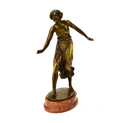 537 - A bronze figure of a semi-nude girl, early 20th century Of dark gold patina, modelled in mid-stride ... 