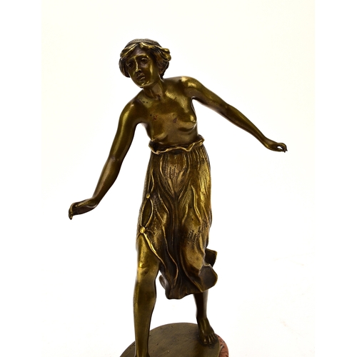 537 - A bronze figure of a semi-nude girl, early 20th century Of dark gold patina, modelled in mid-stride ... 