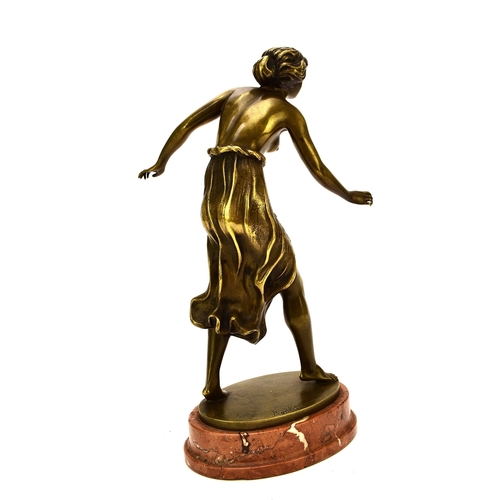 537 - A bronze figure of a semi-nude girl, early 20th century Of dark gold patina, modelled in mid-stride ... 