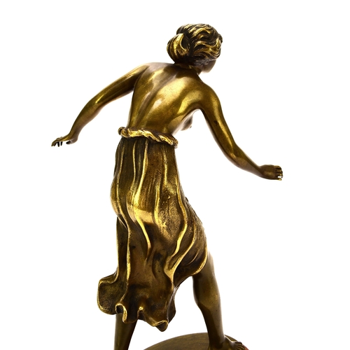 537 - A bronze figure of a semi-nude girl, early 20th century Of dark gold patina, modelled in mid-stride ... 