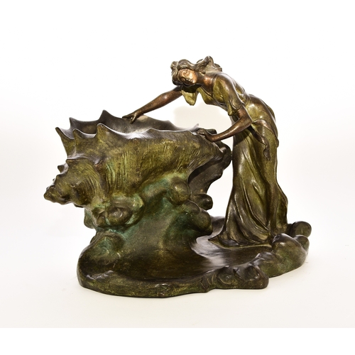 540 - After Andre Barsotti (19th-20th century), a bronze figure of a maiden Circa 1900, modelled as a lady... 