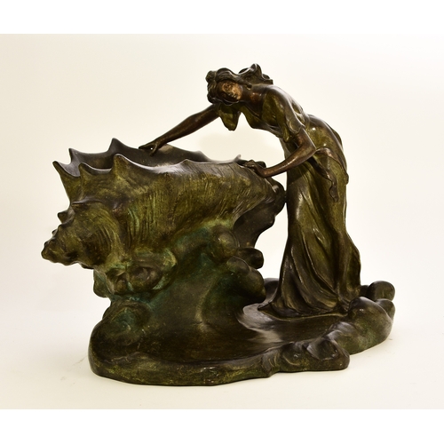 540 - After Andre Barsotti (19th-20th century), a bronze figure of a maiden Circa 1900, modelled as a lady... 