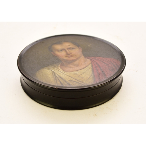 558 - A Stobwasser-type box of Napoleonic interest, 19th century Of circular form and painted with a portr... 