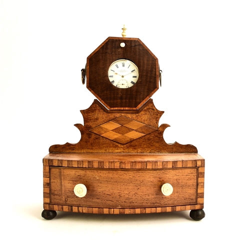 566 - A 19th century inlaid mahogany watch stand The octagonal watch holder raised on a fret cut stand abo... 