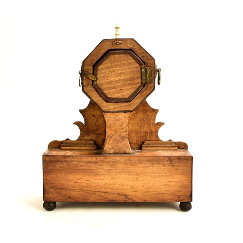 566 - A 19th century inlaid mahogany watch stand The octagonal watch holder raised on a fret cut stand abo... 