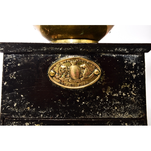 576 - A set of late Victorian cast iron and brass counter top scales By Avery, of balance beam type with c... 
