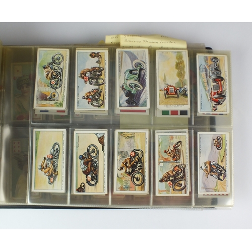 583 - An album containing sets of cigarette cards: Ogdens - motor races - 1931 set of 50 Jockeys - 1930 se... 