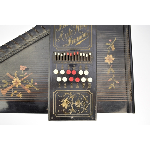 592 - An early 20th century squeeze box concertina Ebonised rosewood inlaid with mother-of-pearl, five fol... 