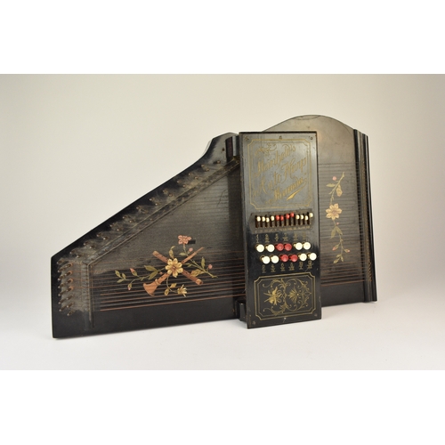 592 - An early 20th century squeeze box concertina Ebonised rosewood inlaid with mother-of-pearl, five fol... 