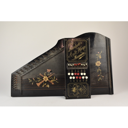 592 - An early 20th century squeeze box concertina Ebonised rosewood inlaid with mother-of-pearl, five fol... 