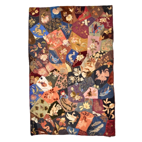 596 - A Victorian embroidered patchwork wall hanging, dated 1892 Worked in asymmetrical coloured fabrics, ... 