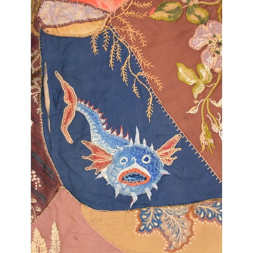 596 - A Victorian embroidered patchwork wall hanging, dated 1892 Worked in asymmetrical coloured fabrics, ... 