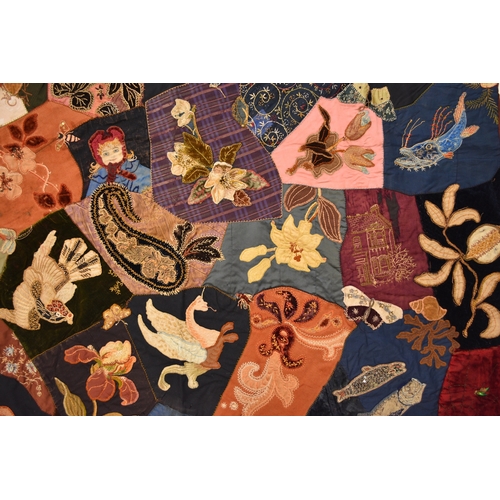 596 - A Victorian embroidered patchwork wall hanging, dated 1892 Worked in asymmetrical coloured fabrics, ... 