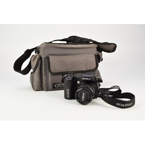 602 - A collection of roll film cameras and lenses To include: Two Nikon F2 35mm SLR camera bodies, circa ... 