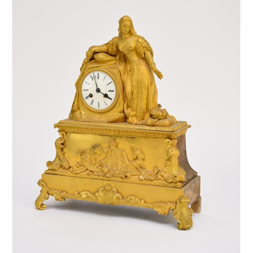 614 - A 19th-century French gilt bronze figural mantel clock Formed as a Renaissance lady or Queen holding... 