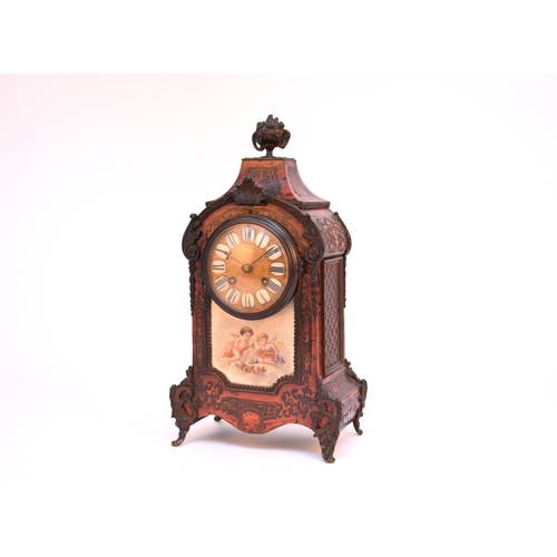 616 - A late 19th century French bronze-mounted boulle mantel clock In the Louis XIV style and of rectangu... 