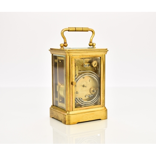 637 - A French brass diminutive carriage clock, early 20th century The plain case with carrying handle, th... 