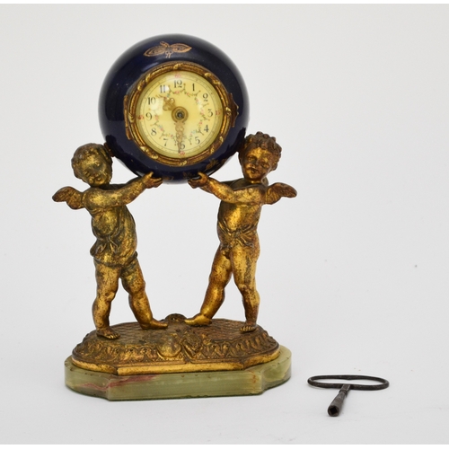 645 - A French Louis XV style gilt metal figural timepiece, early 20th century The globe movement case in ... 