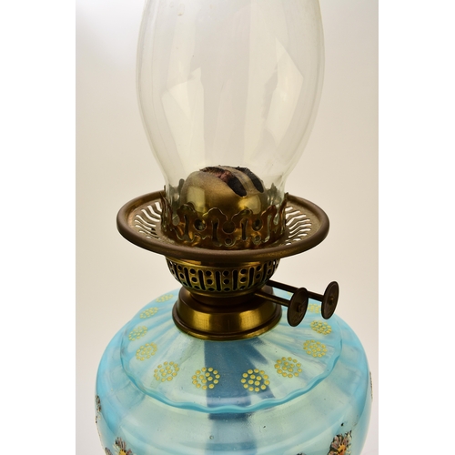 651 - A Victorian brass and enamelled glass oil lamp With vaseline glass cylindrical shade. 73cm high