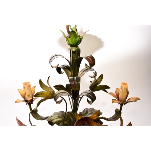 654 - A French three-branch tole flower chandelier, brightly painted and modelled as a bouquet of lilies, ... 