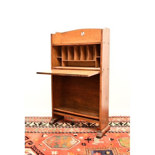 657 - An Arts and Crafts style ash student's desk In the manner of Shapland and Petter, the gallery top wi... 