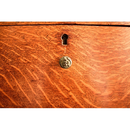 657 - An Arts and Crafts style ash student's desk In the manner of Shapland and Petter, the gallery top wi... 