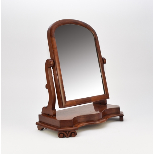 665 - Two Victorian mahogany toilet mirrors The first of arch-top form on a serpentine shape base, 56cm hi... 