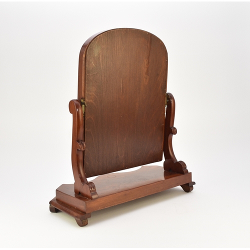 665 - Two Victorian mahogany toilet mirrors The first of arch-top form on a serpentine shape base, 56cm hi... 