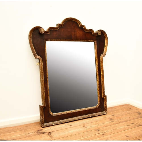 666 - A 19th century gilt gesso and mahogany wall mirror The rectangular plate within a mahogany frame wit... 