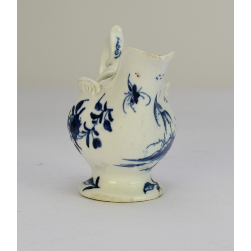 106 - A Derby porcelain 'Cannonball' dolphin cream boat circa 1765-9 painted in underglaze blue, unmarked,... 