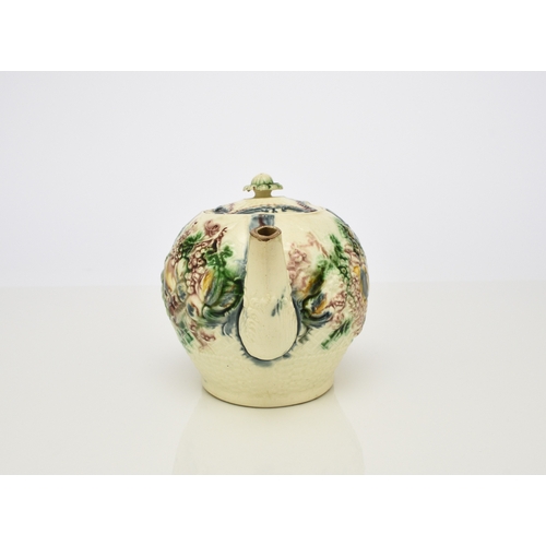 109 - A William Greatbatch creamware 'Fruit Basket' teapot and cover, circa 1770, of globular form, moulde... 