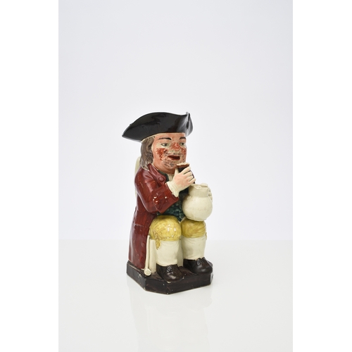 112 - A Wood family toby jug, circa 1790-1800, of 'Mould 51' type (raised glass), the unusually bearded fe... 