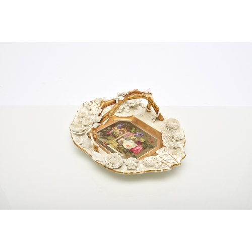 136 - A Rockingham porcelain basket, circa 1835, of canted rectangular form with central entwined handle, ... 