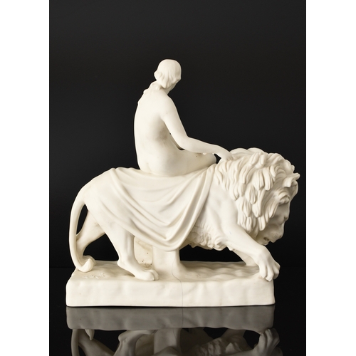 137 - A Minton parian figural group of Una and the Lion after a model by John Bell (1812-1895), the nude f... 