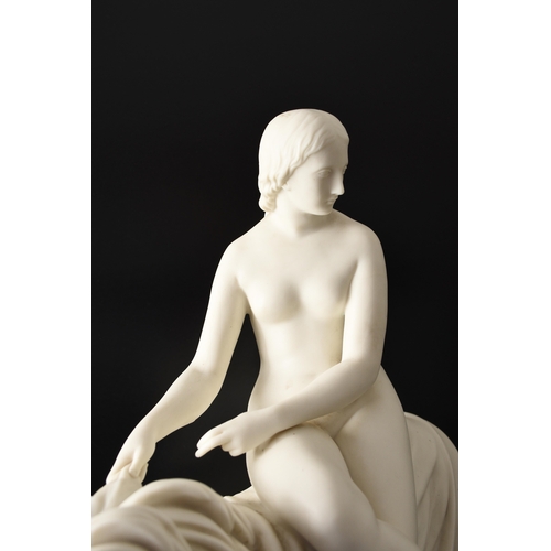 137 - A Minton parian figural group of Una and the Lion after a model by John Bell (1812-1895), the nude f... 