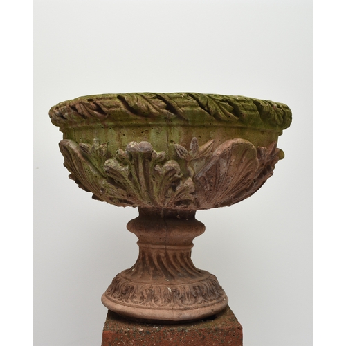 220 - A pair of buff terracotta garden urns First half 20th century, the rims moulded with acanthus leaves... 