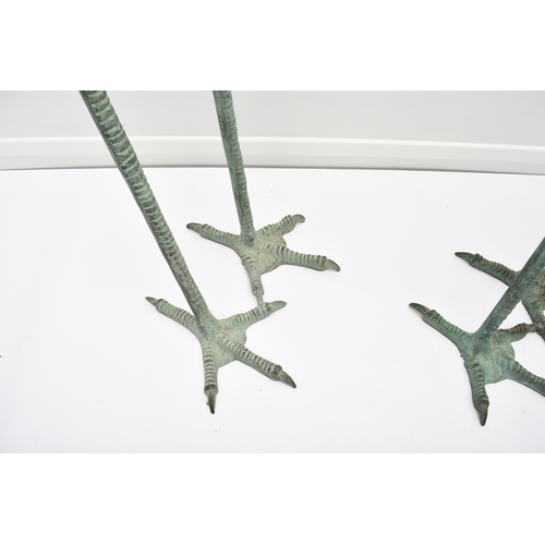 223 - A pair of bronze garden statues of crane birds, 20th century Both modelled standing, one with head r... 