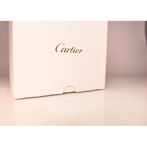 56 - Cartier: A gentleman's stainless steel and 18ct gold wristwatch Model: Santos 100 Reference: 2878 Da... 