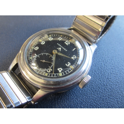 57 - Longines: A stainless steel manual wind military issue wristwatch Model: Dirty Dozen Reference: 2308... 