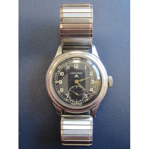 57 - Longines: A stainless steel manual wind military issue wristwatch Model: Dirty Dozen Reference: 2308... 